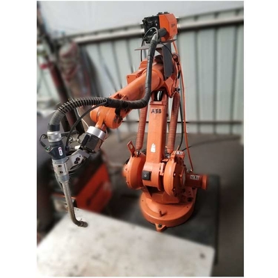 6 assi braccio robotico ABB IRB 1410 con stazione di pulizia delle armi CNGBS per automazione dei robot di saldatura